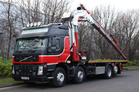 Volvo fm 480 8x2 cormach 51800 crane flatbed truck for sale comvex trucks uk